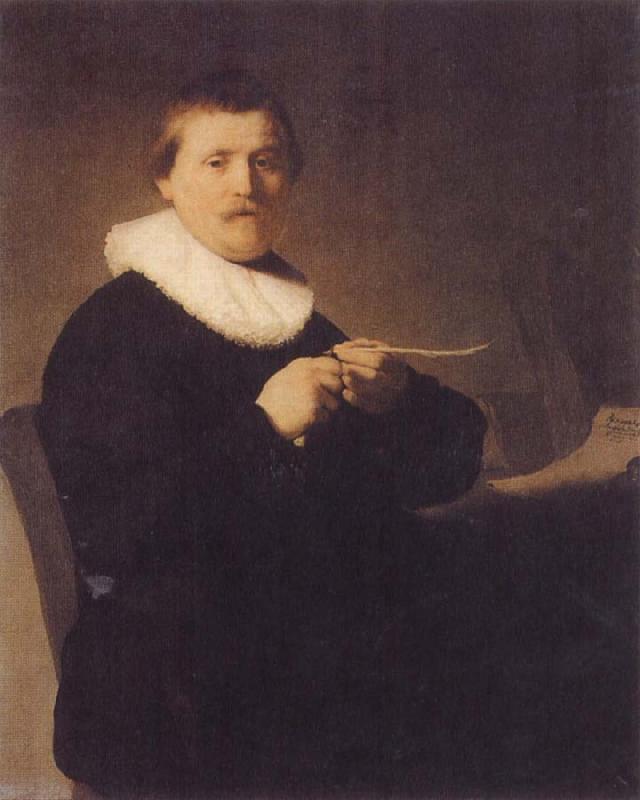 REMBRANDT Harmenszoon van Rijn Young Man Sharpening a Pen oil painting image